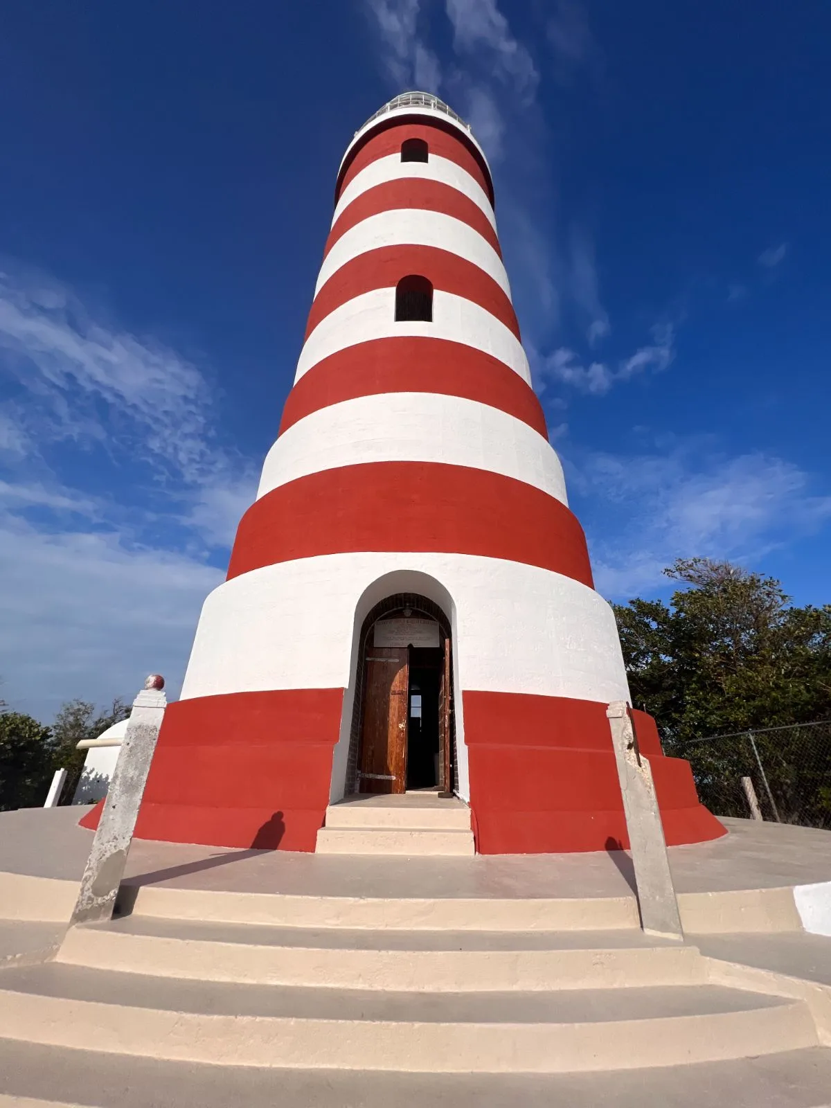 Looking up at the candy-striped Hope Town lighthouse on Elbow Cay