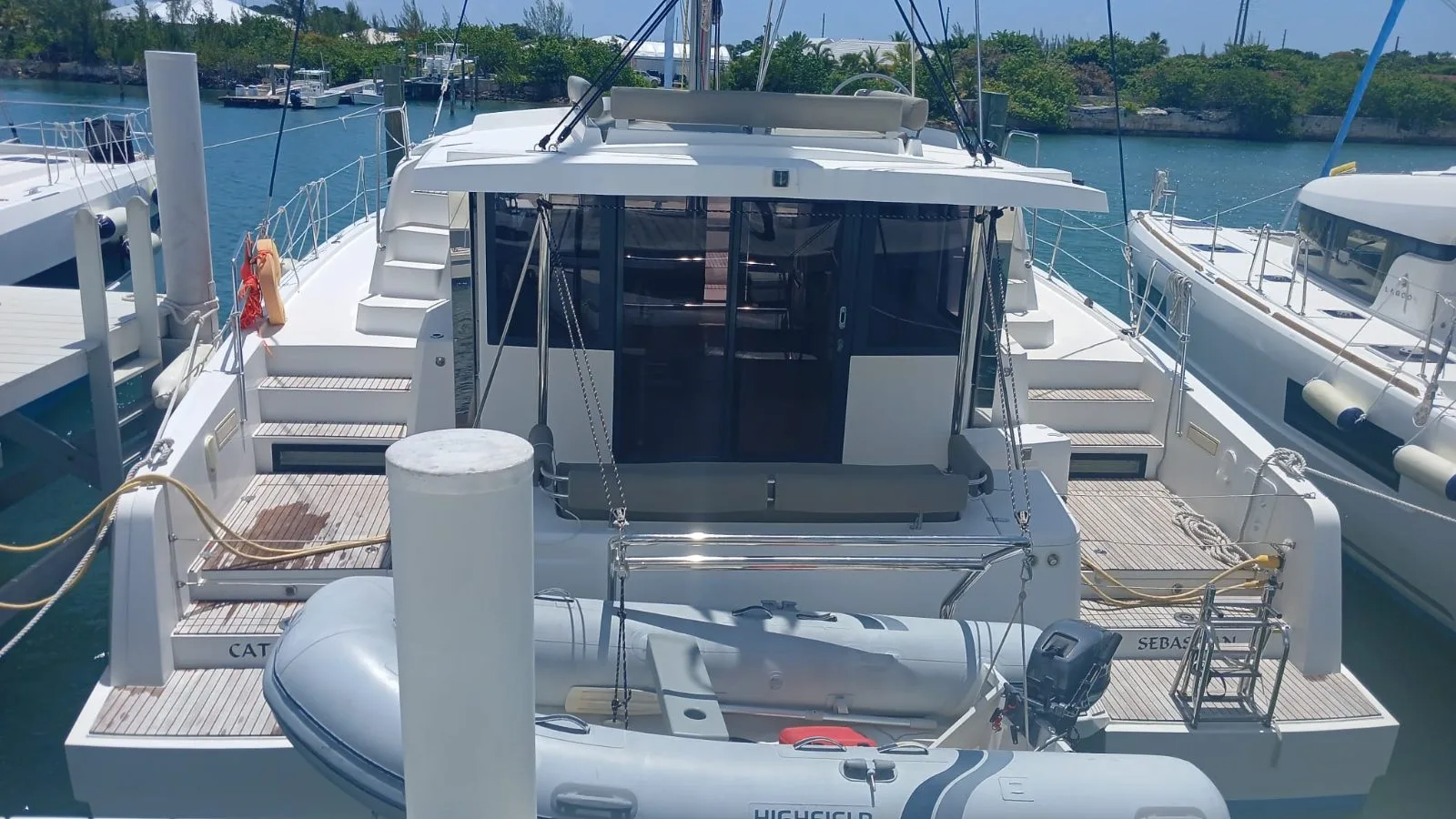 Cat Tales at her berth, aft view with boarding platforms