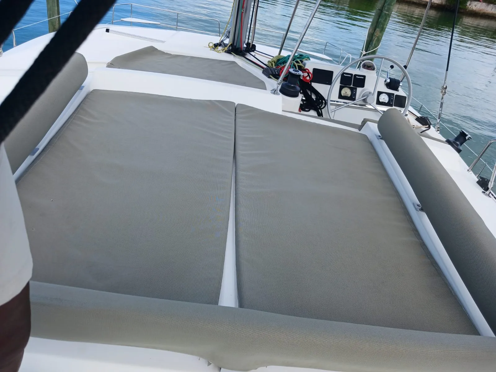 The flybridge sunpads and helm of Cat Tales