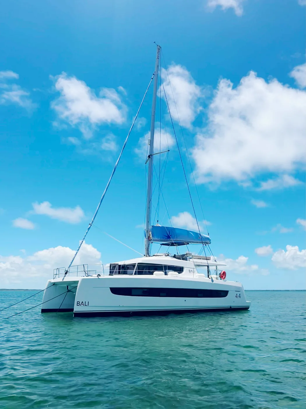 Exodus at anchor over turquoise water in the Sea of Abaco