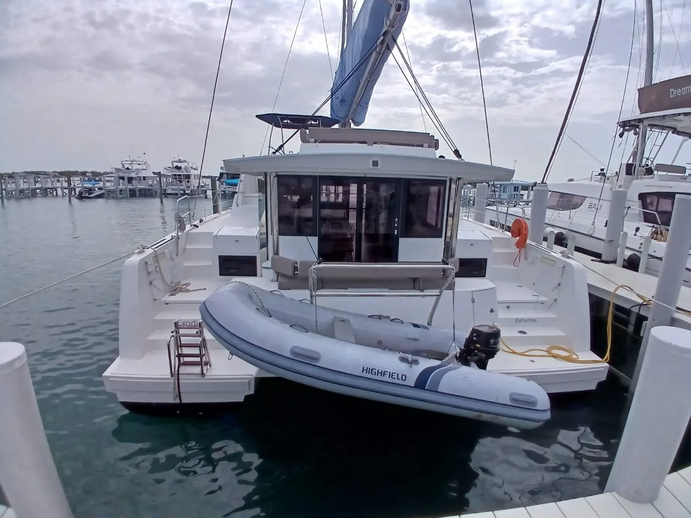Exodus at her berth — aft view with cockpit and boarding platforms
