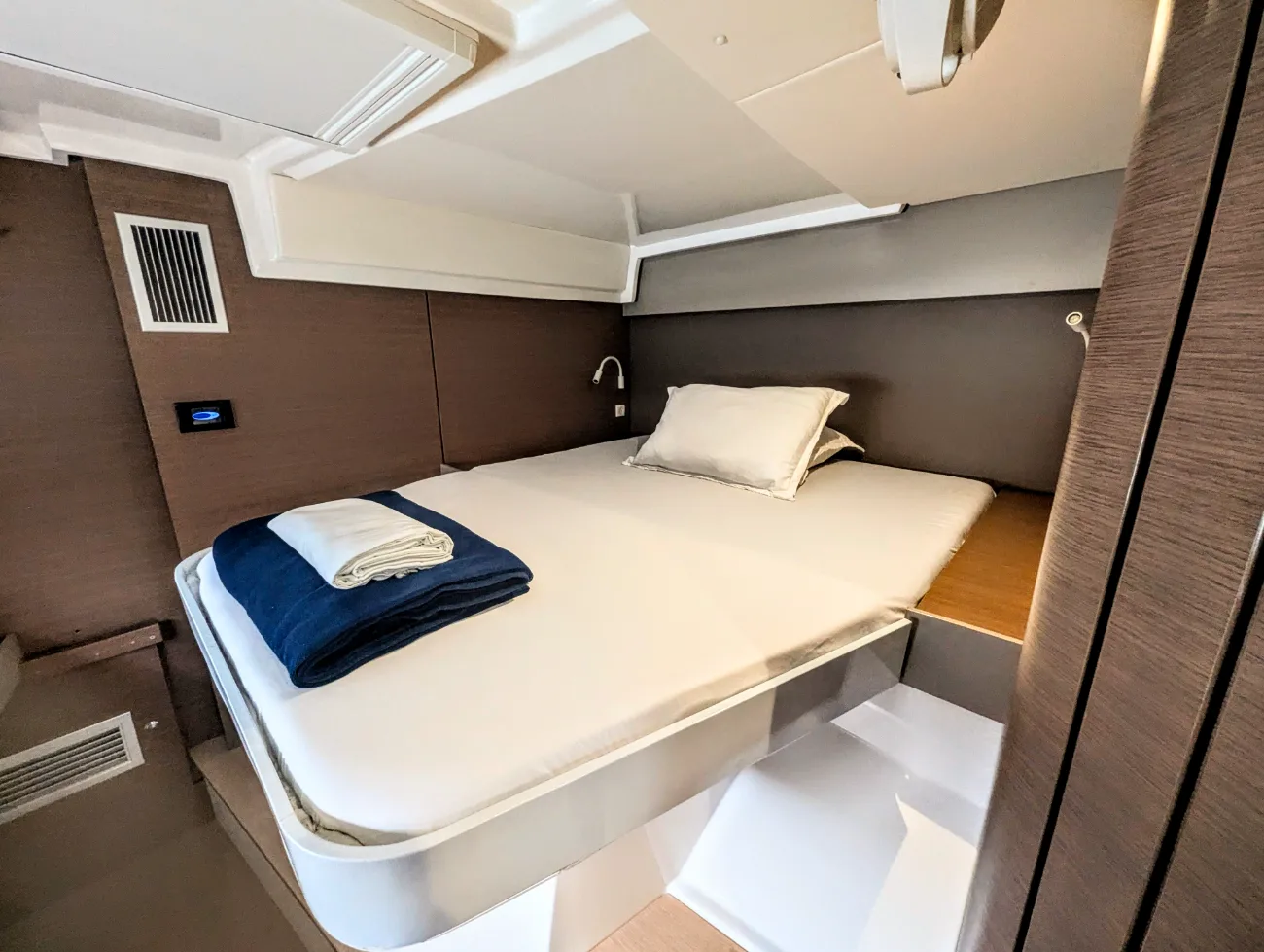 An aft double cabin aboard Let's Geaux with island berth