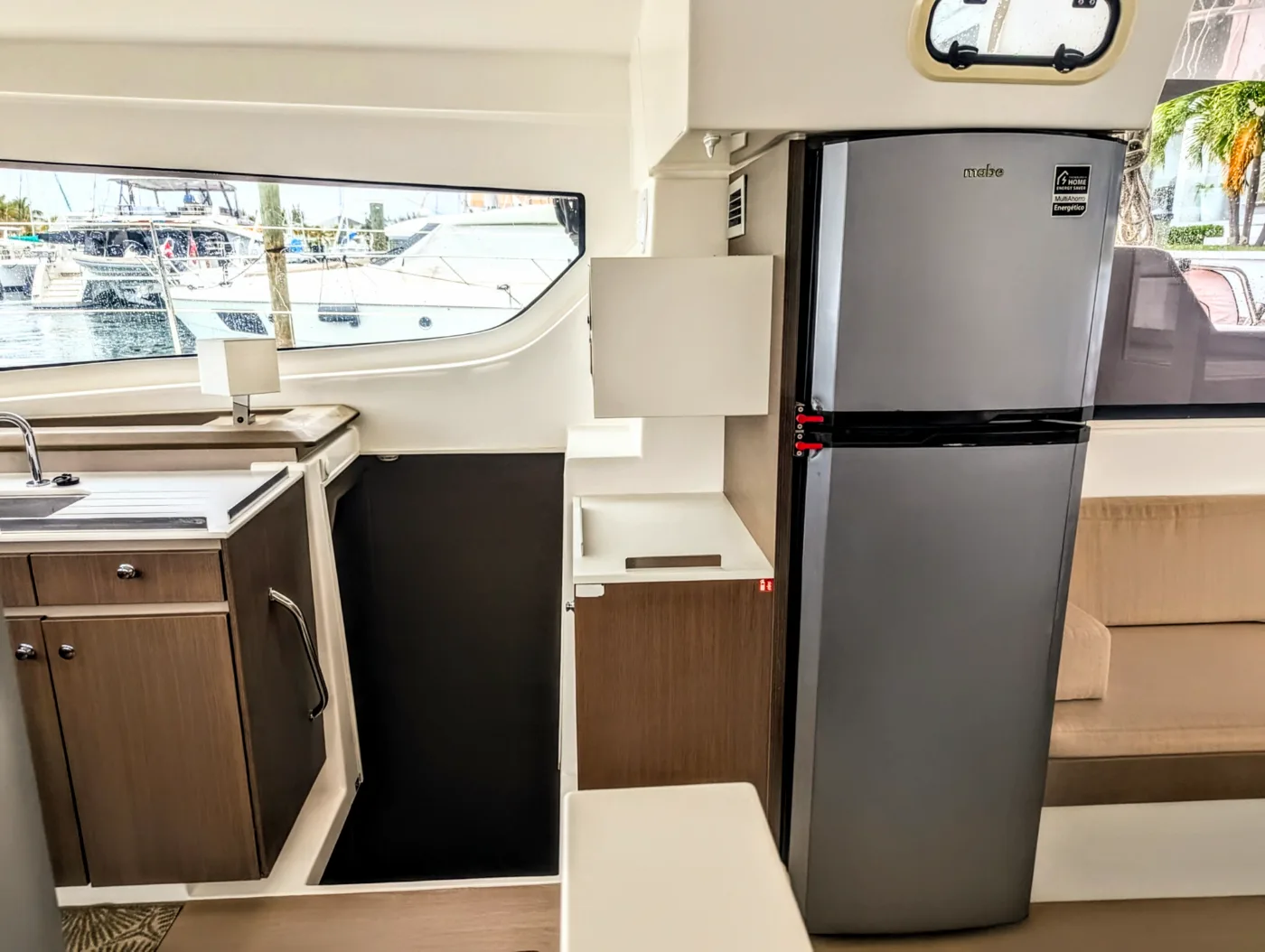 The galley and full-height fridge aboard Let's Geaux
