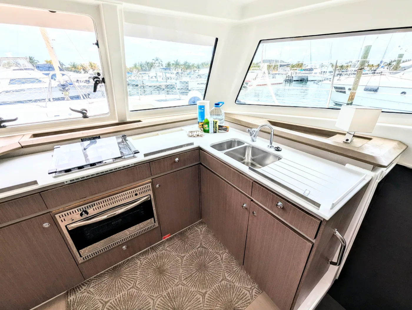 The galley aboard Let's Geaux with oven, gas hob and double sink