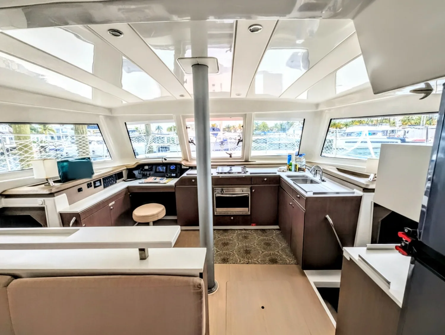 The saloon of Let's Geaux looking forward to the galley and helm