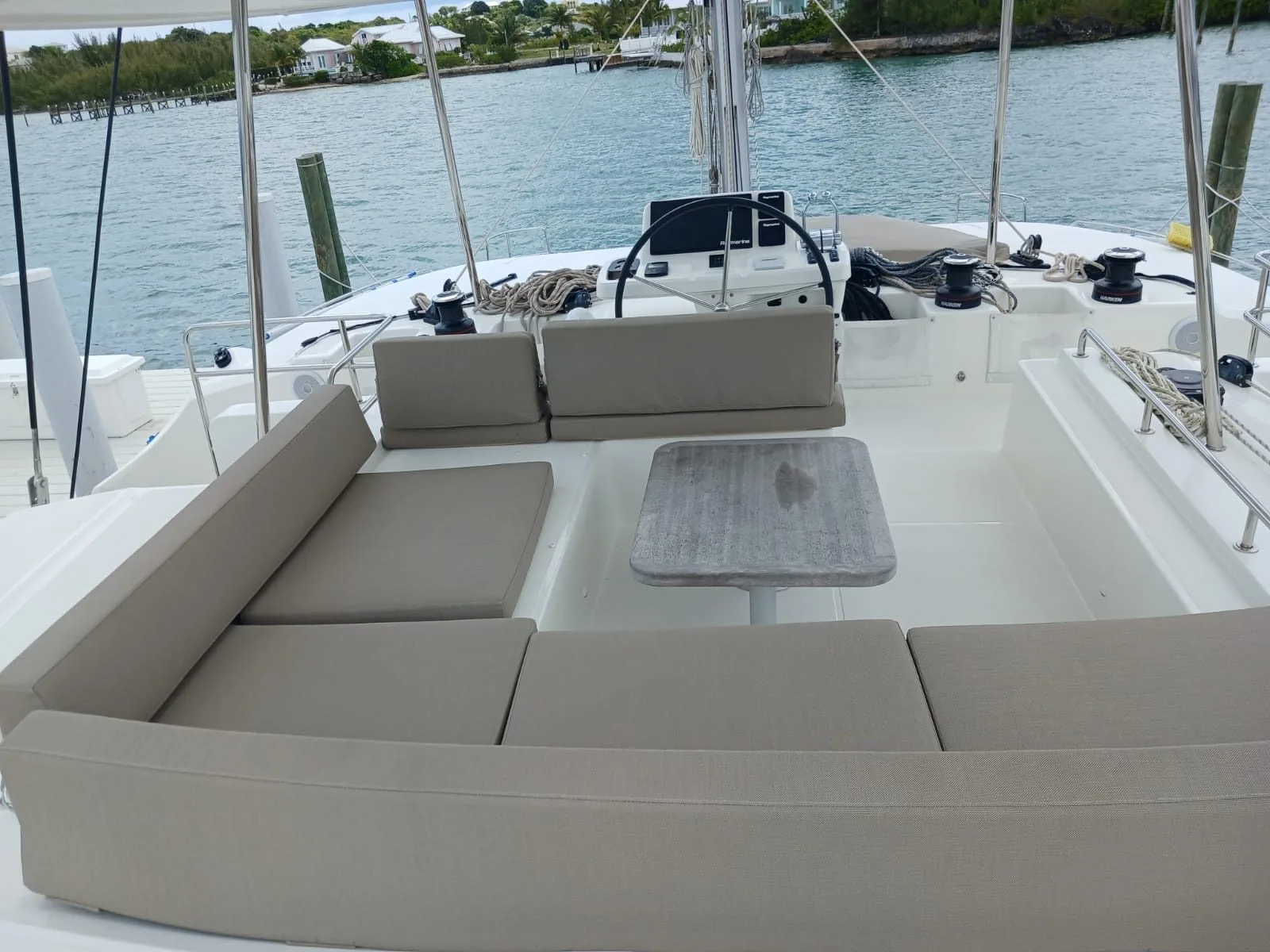 The aft cockpit of Sapphire Seas, with wraparound seating and helm